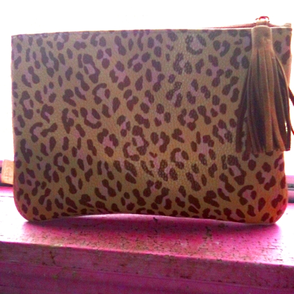 Pocket book/makeup bag with vest to go with it